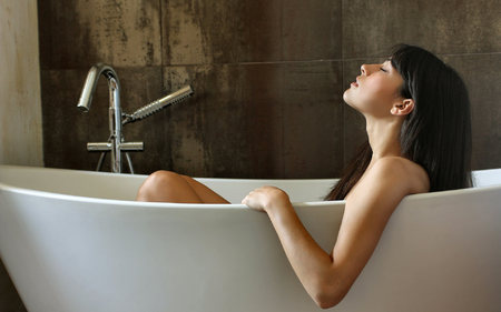 Relaxation Fashion in Old Fashioned Bathtub